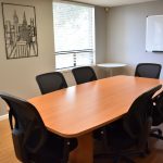 Conference Room with table and whiteboard