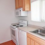 kitchen sink stove and dishwasher in 2 bedroom flat